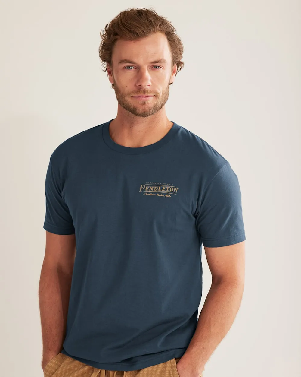 Pendleton Woolen Mills Vintage Logo Graphic Tee in Navy Gold