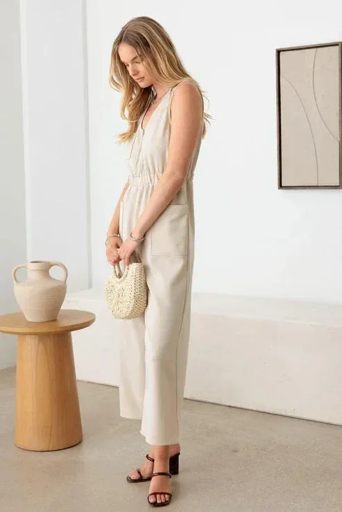 SLEEVELESS FRONT ZIPPER WIDE LEG JUMPSUIT